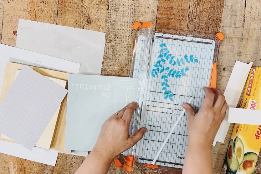 trimming the paper with a cutter
