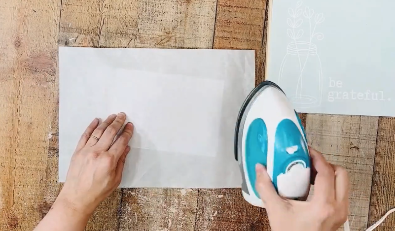 ironing over the design and parchment paper