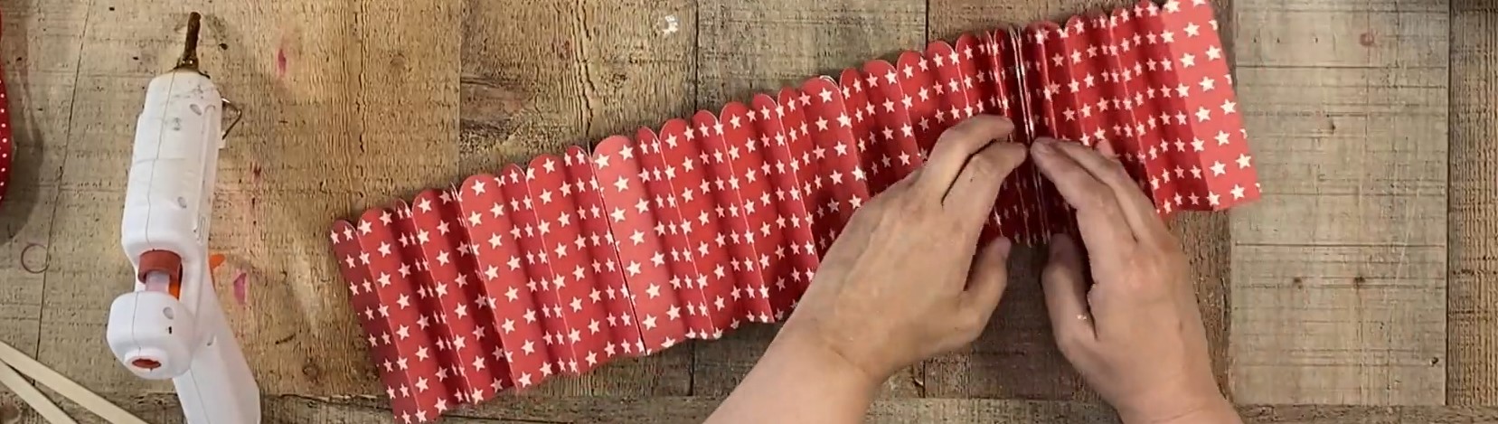 Red star card stock folded accordion style.
