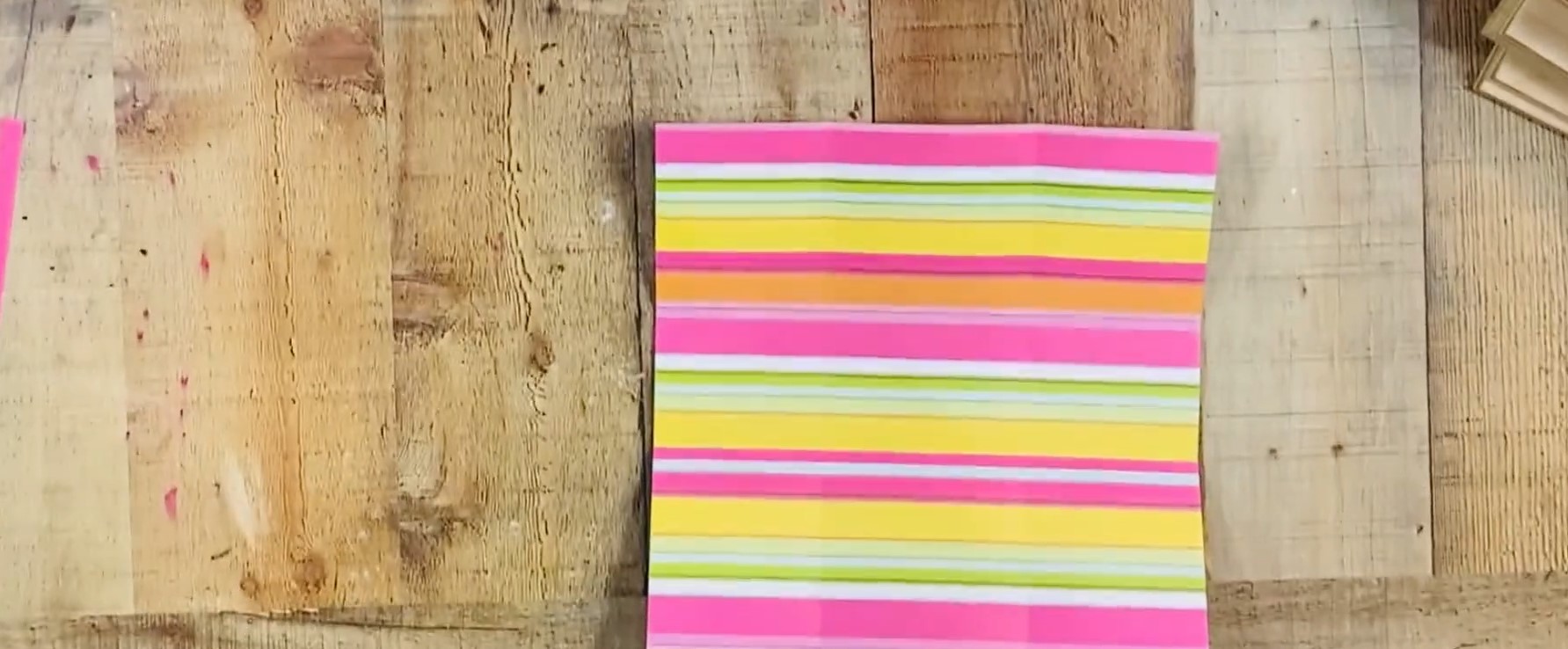 Fold paper on score lines.